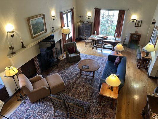 Living room was large leading to other rooms such as the office, kitchen, staircase to upstairs bedrooms and the front door.