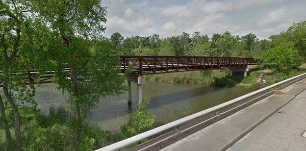 Pedestrian bridge over the slough. This is part of the Armand Bayou Hike and Bike Trail that runs from Fairmont to Bay Area Blvd.