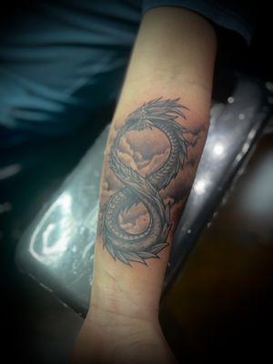 Infinity Dragon done by Gabe. 831 INK Monterey Ca premier tattoo studio