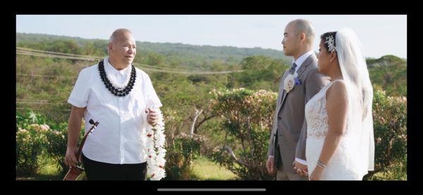 Charles officiating our wedding ceremony with the final blessing