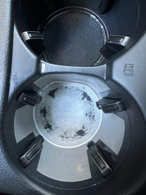 Cupholder AFTER I cleaned it myself and had to pay $120 for a car detailing he was initially about to charge $250 for!!! Ridiculous !!