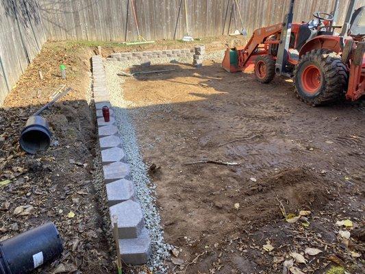 Retaining wall going in.