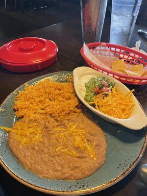 Rice, Beans, Sour Cream, Guacamole & flour tortillas that came with the steak fajitas