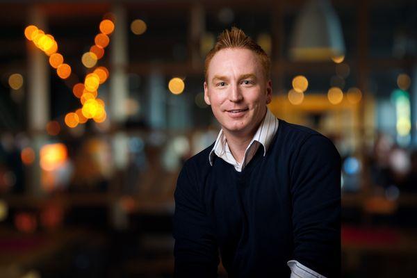 Branding Photo of Man in Restaurant.