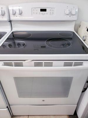 GE Glass Top Oven with 4 Burners and Self Cleaning