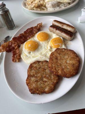 My food-Mateo's Combo-3 eggs sunny side up, 2 potato pancakes, bacon, and sausage links