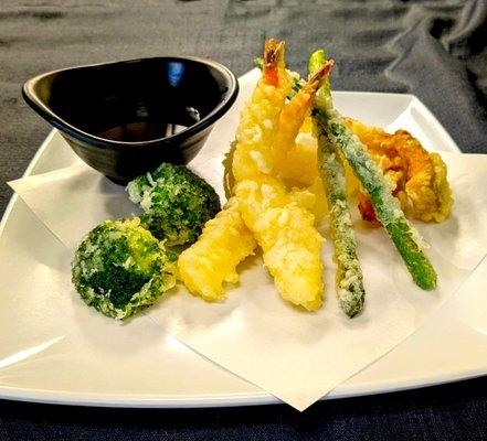 Crispy, light, and packed with flavor - that's our mixed tempura! Perfect for those looking to savor something different.