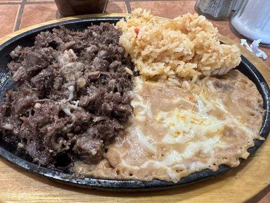 Barbacoa Plate with Mexican Rice and Refried Beans with Cheese