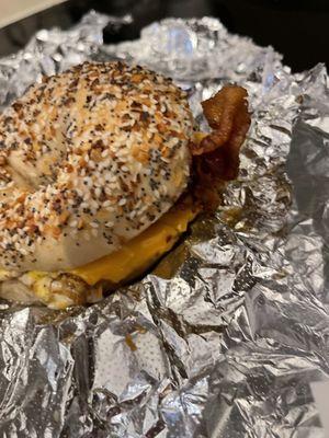 Bacon egg and cheese on spicy everything bagel