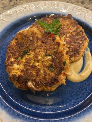 Jumbo Lump Crab Cakes accompanied by Dijon