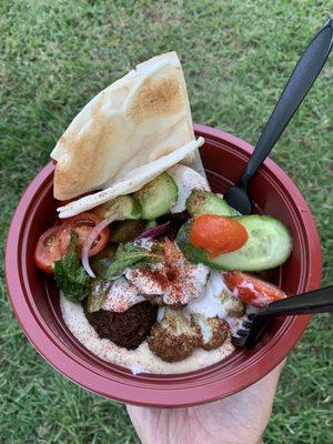 Green bowl with tabouleh and cauliflower