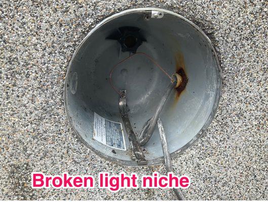 This is broken light niche that was previously installed incorrectly with modifications years ago. We installed a new light niche.