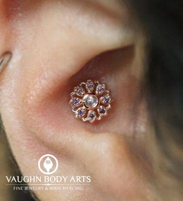 Conch piercing with a "Rosette" made of 14k Rose Gold with Genuine Amethyst & Rainbow Moonstone.