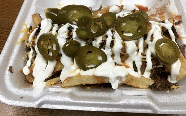 Got some loaded fries with brisket and all the trimmings to-go today!  Damn good!!  Lots of food and only $5.50.  Hard to beat that.