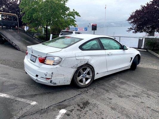 Car hit freeway wall in hydroplane incident