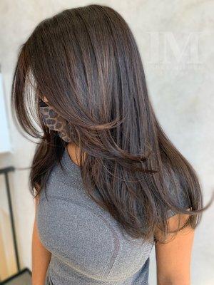 Chocolate Beige all over color styled with a voluptuous blowout!