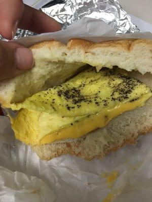 Egg and cheese on a roll with salt and pepper. $2.75