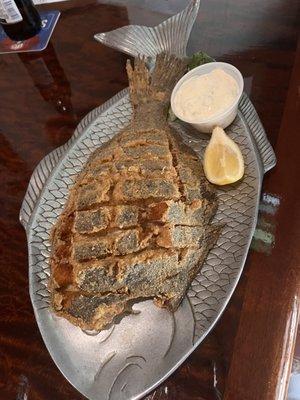 Flounder. It also comes with 2 sides. Great happy hour. $1 oysters. Delicious food.