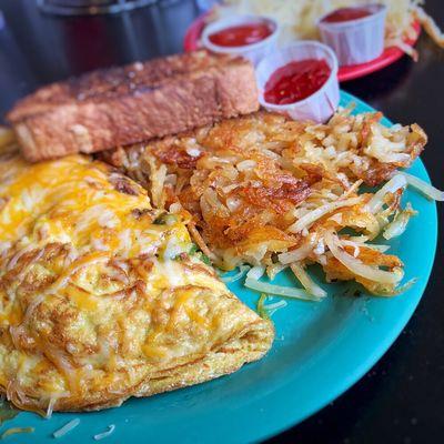 St. Pat's Day Omelette: Corned Beef, Green Peppers, Onions, Cheese, Hashbrowns, Toast