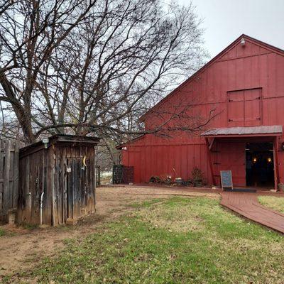 The barn and outhouse.