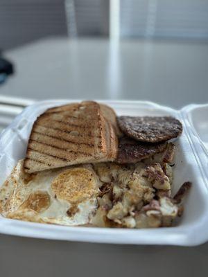 2 eggs platter with sausage and home fries