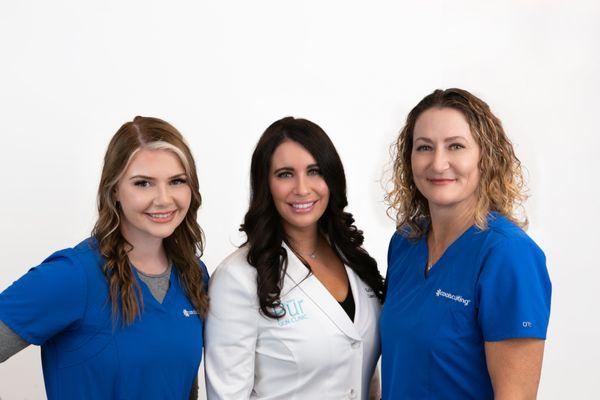 Our Body Contouring Team, which includes Dr. Kaitlin Brasier and our Certified CoolSculpting Technicians, Katie and Raina