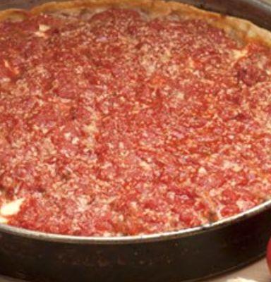 Typical amazing Malnatis deep dish cheese pizza with their nice chunky top sauce!