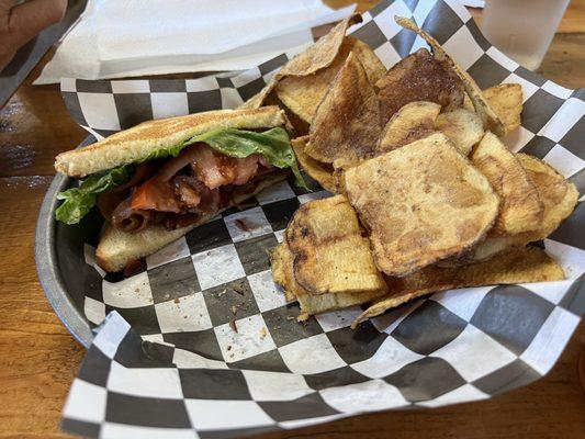 Bacon lettuce and tomato with homemade chips. The bacon is so smoky