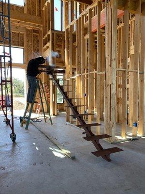 Floating metal stairs in progress