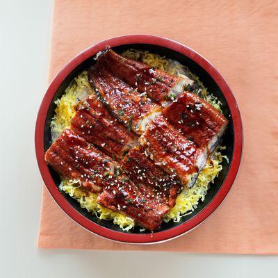 Whole Eel Unaju over shredded tamago and rice. Topped with savory furikake!