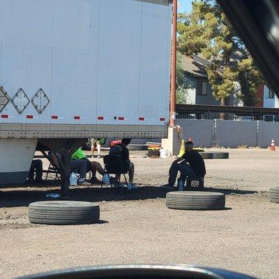 The instructors seen here just sat in the shade and talked bad about students.