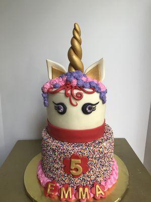 Unicorn cakes have been very popular in 2017 and 2018! This one was fun and whimsical for a 5-year-old's big day!