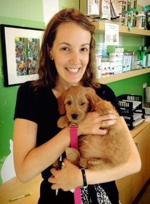 Dr. Stricker loves getting puppy hugs!