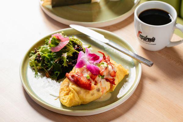 Lobster omelet, arugula mix