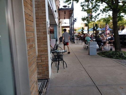 Outdoor seating space for the shops