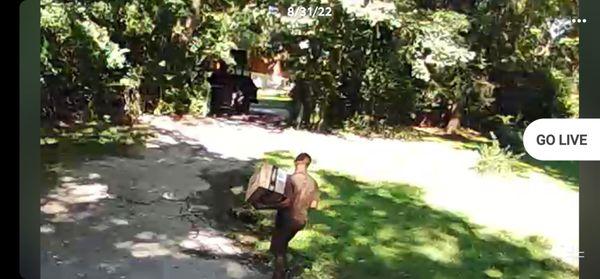 Ups express driver walking off with my package. Package now missing.  Ups don't care about it.  08.31.2022