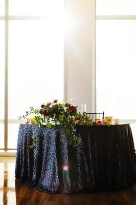 Custom black sequin linen for our sweetheart table at The Ultimate Skybox (Photo by Chaz Cruz Photography - www.chazcruz.com]