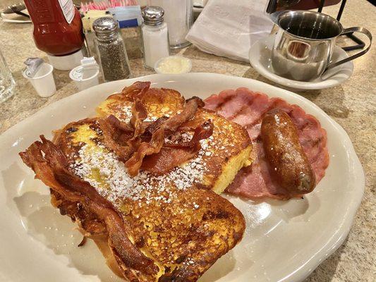 Delicious!!! challah French Toast with bacon, sausage and ham!