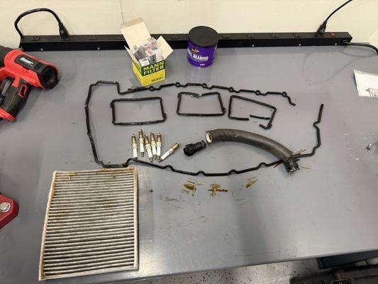 Valve cover gasket, spark plugs, cabin air filter, etc.