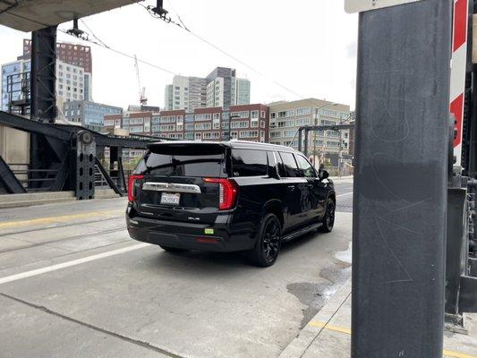 UCS Limo's triple black Yukon out in the city!