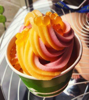 Fruity combo frozen yogurt with fruity pearls.