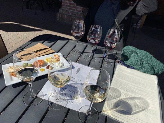 Wine flights and charcuterie on a nice sunny yet chilly day