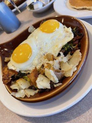 Vegetarian Skillet with added ham and well done vegetables.