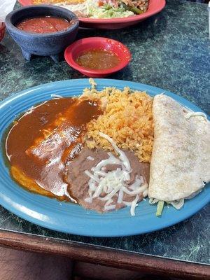 #3 lunch special soft chicken taco, cheese enchilada rice and beans