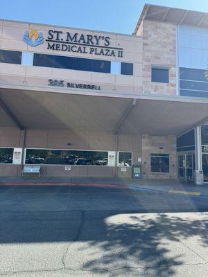 The building, Radiology Unlimited has no sign on outside. These ground floor windows are where the waiting room area is