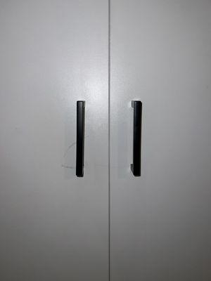 Crooked door knobs with scuff marks