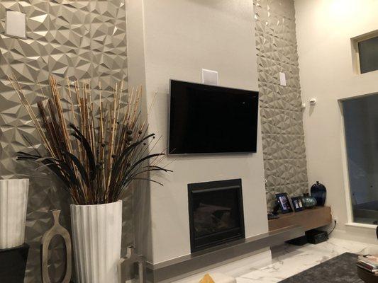 Livingroom surround sound with tv mounted to get a clean modern look.