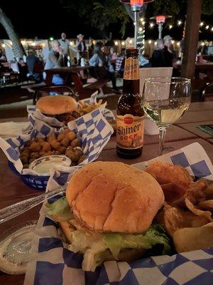 Yardbird (chicken sandwich) Fried Okra, The Triple Pig, cold beer and wine. The lively people in the background. Great atmosphere