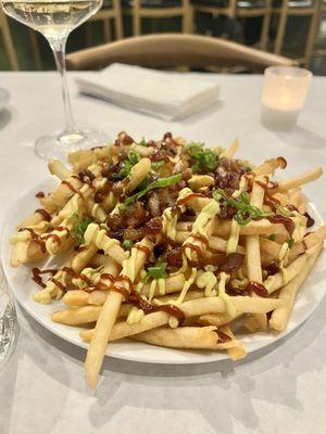 The most amazing fries you will ever eat, bits of pork belly, green onion and two of the tastiest sauces to compliment it.