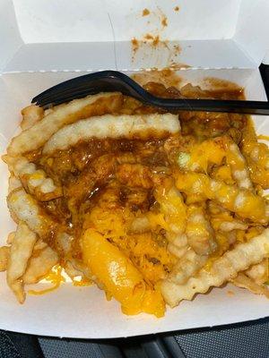 Chili cheese fries & they threw in a blob of cheese